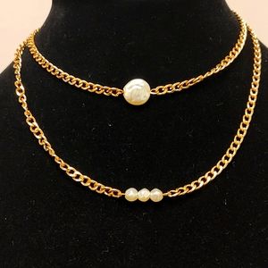 Beautiful Double Layered MultiStrand Faux Pearl in gold tone